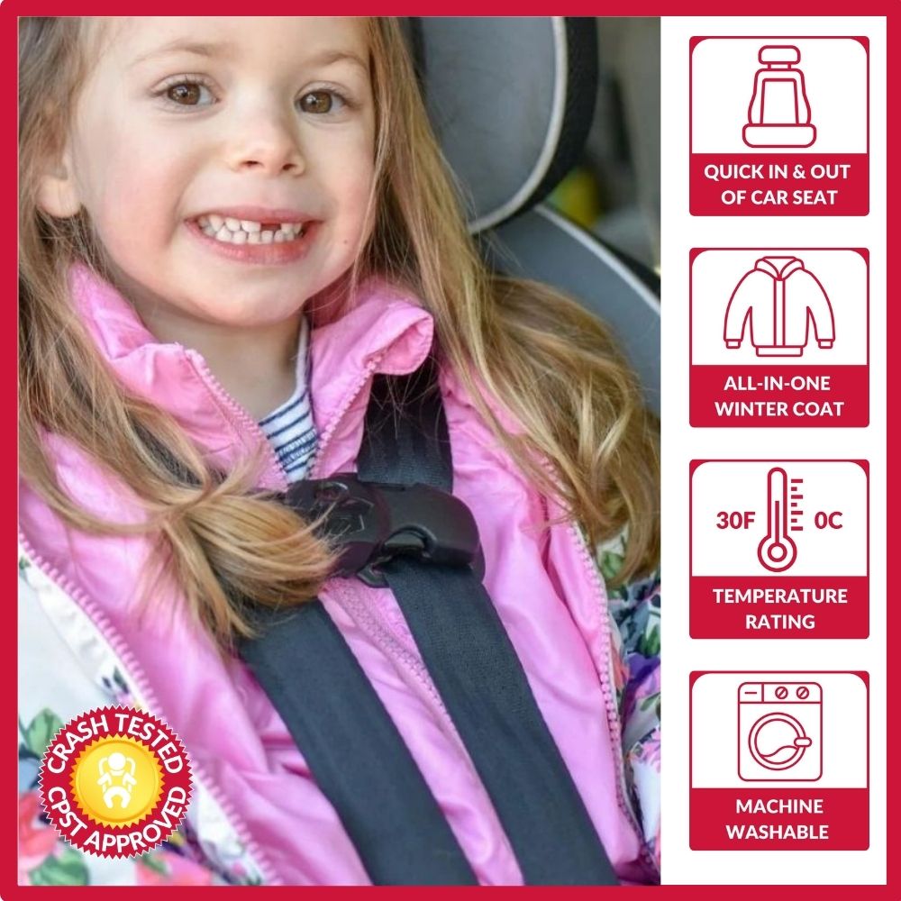 Child in floral print Road Coat Transition safely buckled in car seat – crash tested car seat coat