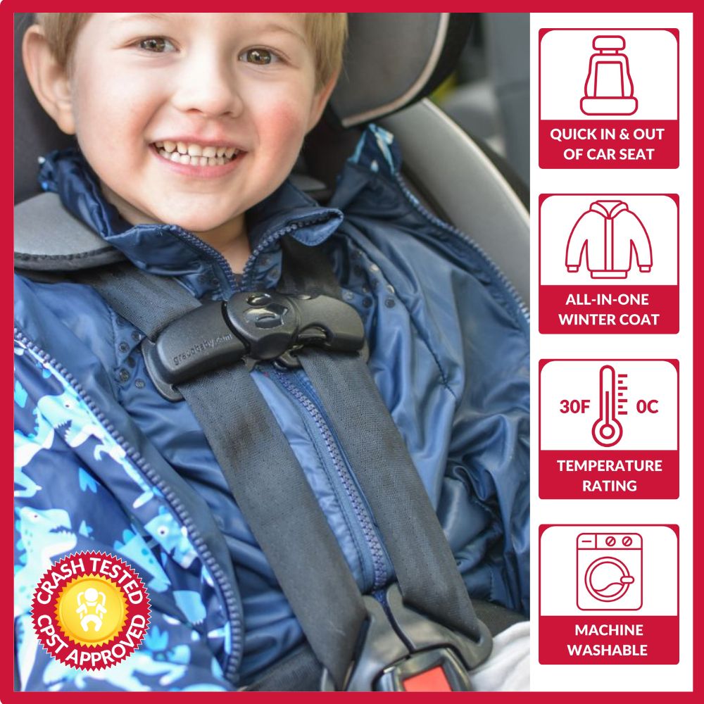 Child in navy raptor print Road Coat Transition safely buckled in car seat – crash tested car seat coat