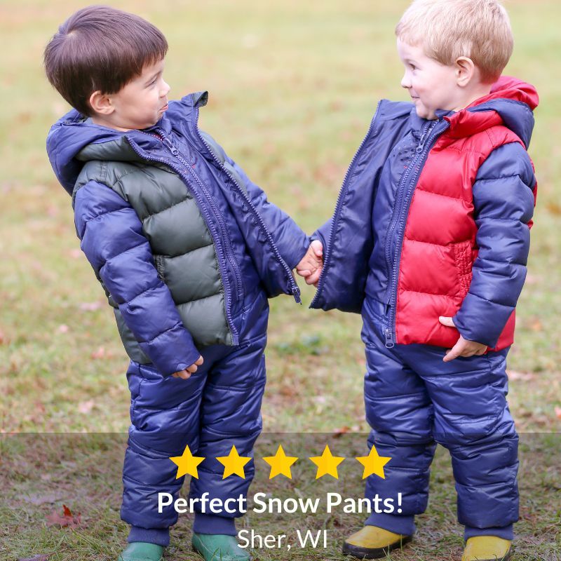 Kids wearing One Kid Soft Pack-able Snow Pants and The Road Coat Down.