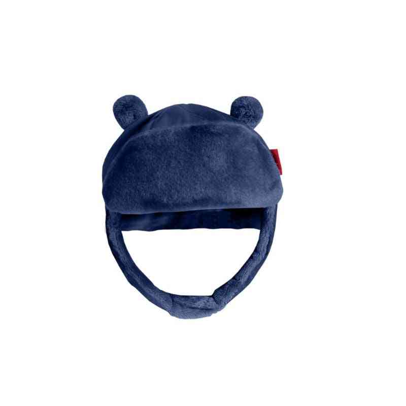 One Kid Quilted Bomber Hat in Navy – front view showing wind- and water-resistant shell and cozy fleece lining.