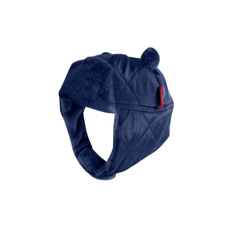 One Kid Quilted Bomber Hat – Navy side view highlighting quilted design, ear coverage, and soft fleece interior.